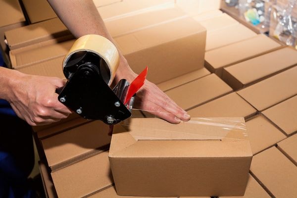 Parcel being sealed and prepared for dispatch